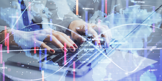 Photo: Hands are typing on a laptop, layered over the picture is a semi-transparent hologram drawing of a world map and business data visualizations