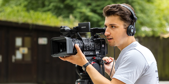 Photo: A student is working with a VJ camera.