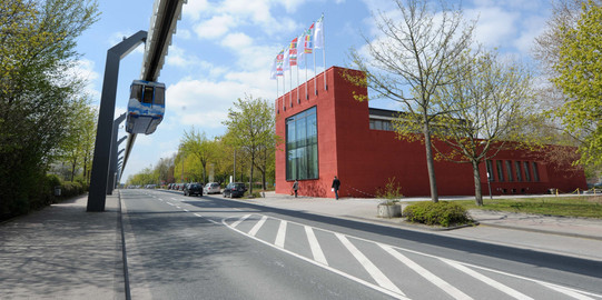 The picture shows the IBZ building and the H-Bahn.